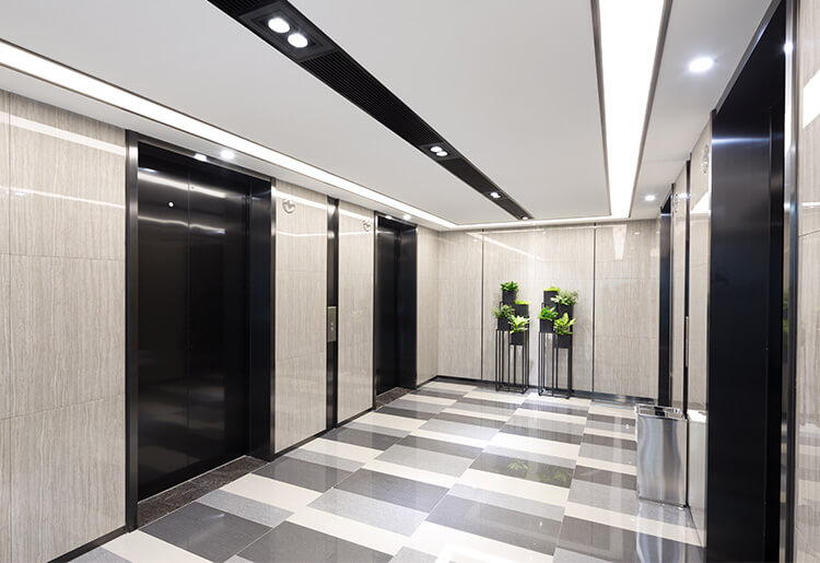 office cleaning in a hallway elevator